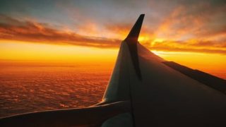flight-sunset-red-clouds